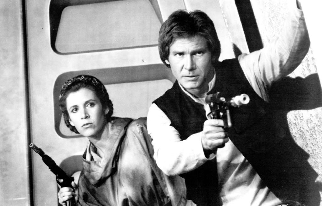 Princesa Leia e Han Solo em cena de Star Wars
